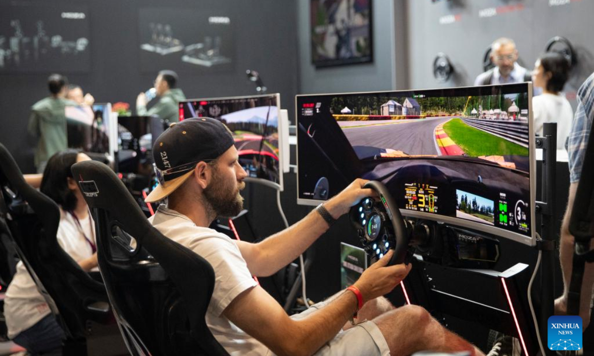 People play games during Gamescom 2024 in Cologne, Germany, Aug 21, 2024. Gamescom 2024 kicked off here on Wednesday, attracting more than 1,400 exhibitors from 64 countries and regions. Photo:Xinhua