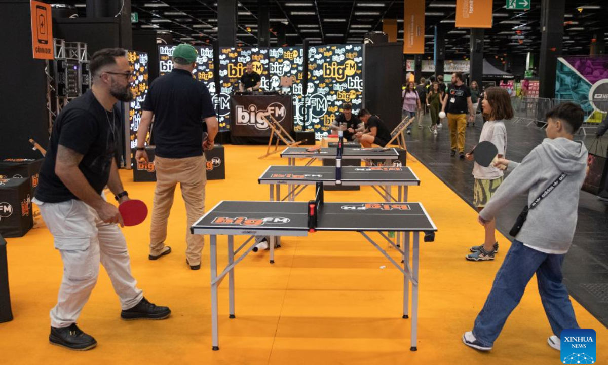 People play mini table tennis during Gamescom 2024 in Cologne, Germany, Aug 21, 2024. Gamescom 2024 kicked off here on Wednesday, attracting more than 1,400 exhibitors from 64 countries and regions. Photo:Xinhua