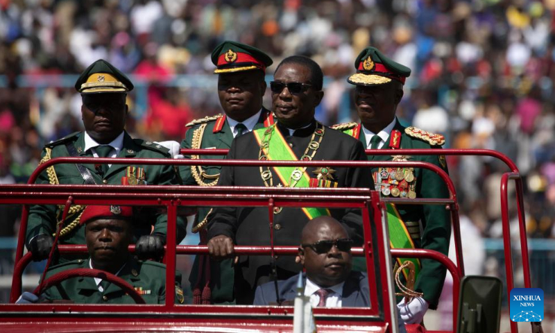 Zimbabwean President Emmerson Mnangagwa (R, Second Row) inspects troops during a celebration for the Defense Forces Day in Harare, Zimbabwe, on Aug. 13, 2024. Zimbabweans on Tuesday commemorated the 44th anniversary of the Defense Forces Day, observed every second week of August, to honor members of the uniformed forces for their duty in protecting the country. (Photo: Xinhua)