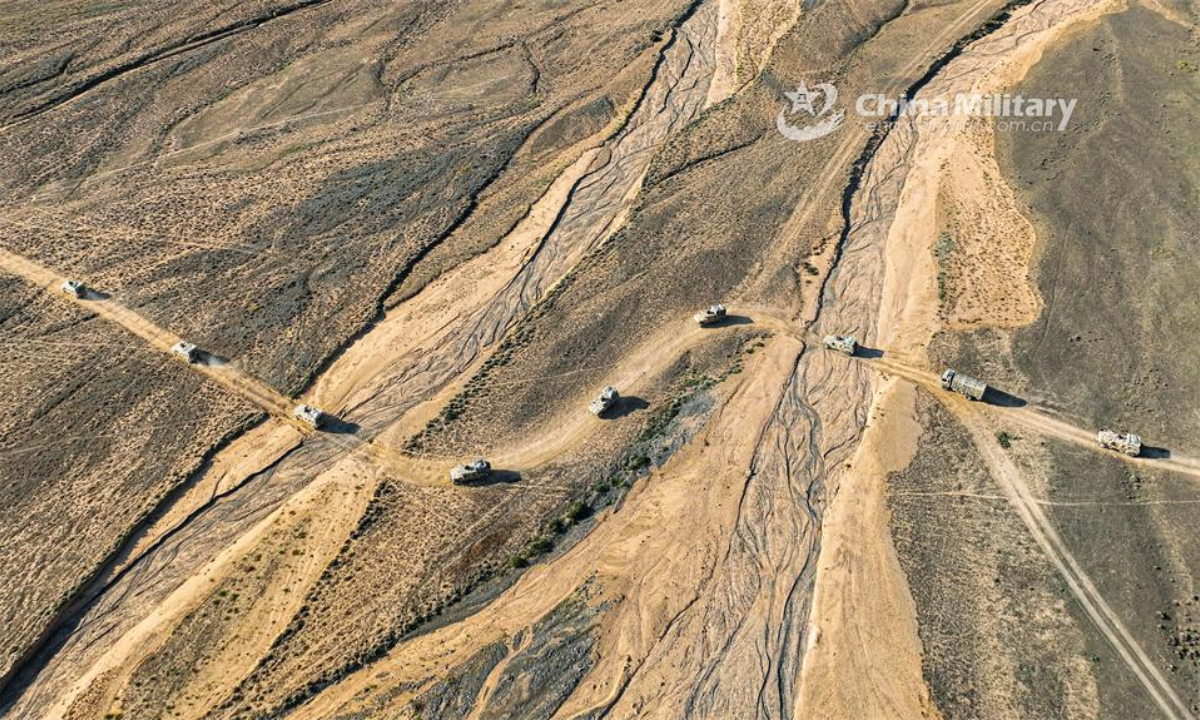 Military vehicles attached to a regiment under the PLA Xinjiang Theater Command are en route to a designated area during a driving training exercise on July 30, 2024. Photo:China Military