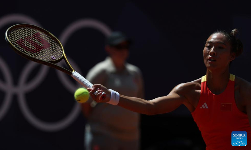 Zheng Qinwen of China competes during the women's singles quarter-final match of tennis between Zheng Qinwen of China and Angelique Kerber of Germany at the Paris 2024 Olympic Games in Paris, France, on July 31, 2024. Photo: Xinhua/Gao Jing