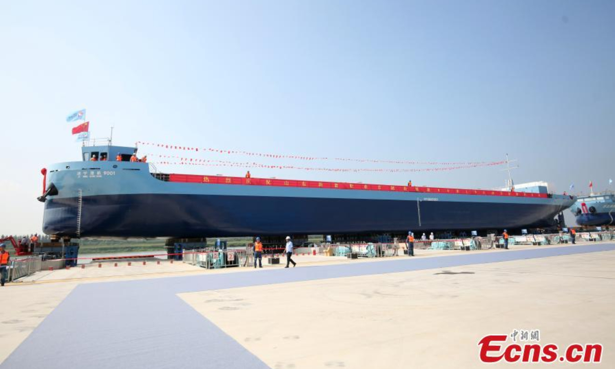 A new energy smart cargo ship, which will run along the Beijing-Hangzhou Grand Canal, is launched in Zoucheng, east China's Shandong Province, Aug 22, 2024. Photo:China News Service