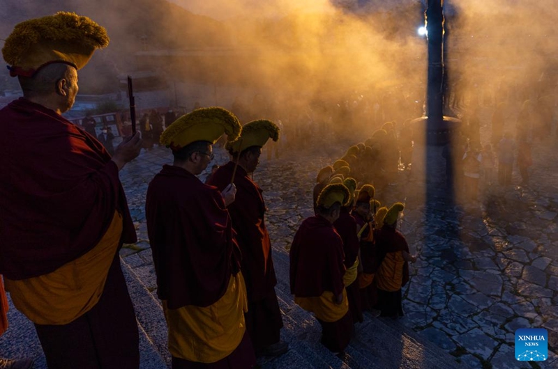 Monks walk out of a hall at the Drepung Monastery in Lhasa, southwest China's Xizang Autonomous Region, Aug. 4, 2024. Celebrations marking the traditional Shoton Festival, or Yogurt Festival, began in Lhasa, capital of southwest China's Xizang Autonomous Region, on Sunday. Photo: Xinhua