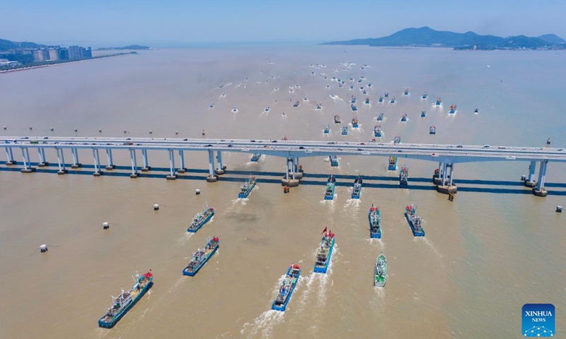 A drone photo taken on Aug. 1, 2024 shows fishing boats departing for fishing from the Shenjiamen fishing port in Zhoushan City, east China's Zhejiang Province. Four types of fishing boats with special permission set sail on Thursday after a three-month summer fishing ban in the East China Sea.  Photo: Xinhua