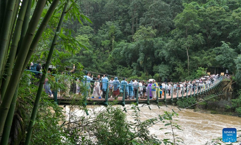 Tourists visit the Huangguoshu Waterfall scenic area in Anshun, southwest China's Guizhou Province, Aug. 2, 2024. Photo: Xinhua