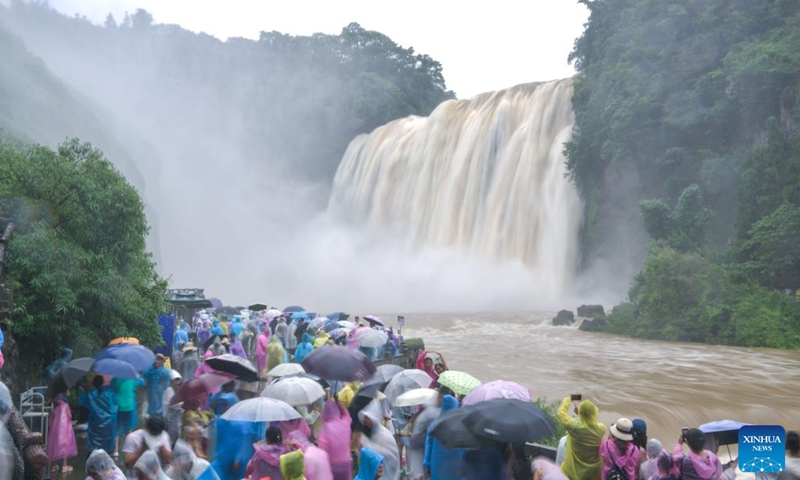 Tourists visit the Huangguoshu Waterfall scenic area in Anshun, southwest China's Guizhou Province, Aug. 2, 2024. Photo: Xinhua