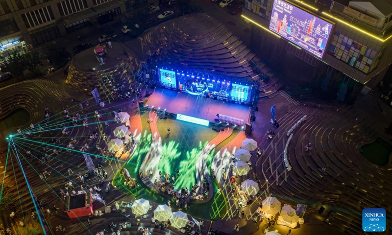 An aerial drone photo taken on Aug. 2, 2024 shows the opening ceremony of the 5th Tianjin Nighttime Life Festival held in north China's Tianjin Municipality. The 5th Tianjin Nighttime Life Festival began here on Friday night and will last about one month. People can enjoy night markets, music shows, sports games and art exhibitions during the festival. Photo: Xinhua