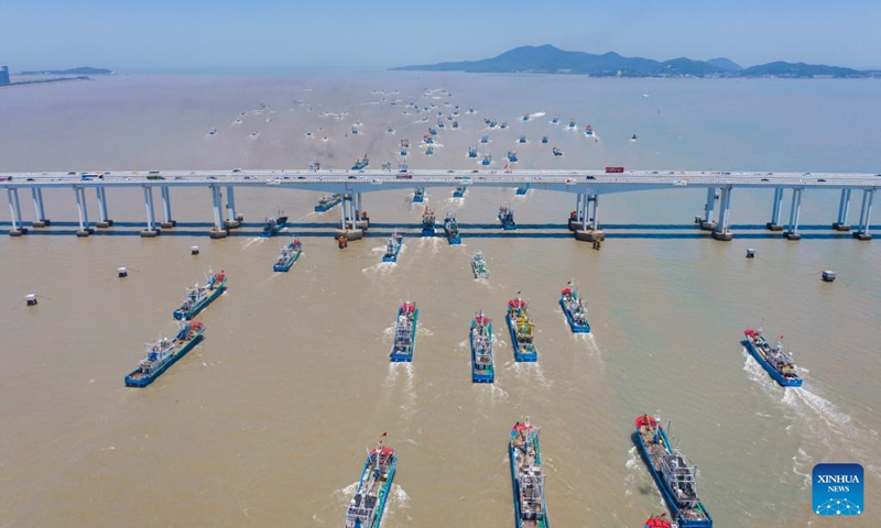 A drone photo taken on Aug. 1, 2024 shows fishing boats departing for fishing from the Shenjiamen fishing port in Zhoushan City, east China's Zhejiang Province. Four types of fishing boats with special permission set sail on Thursday after a three-month summer fishing ban in the East China Sea. Photo: Xinhua