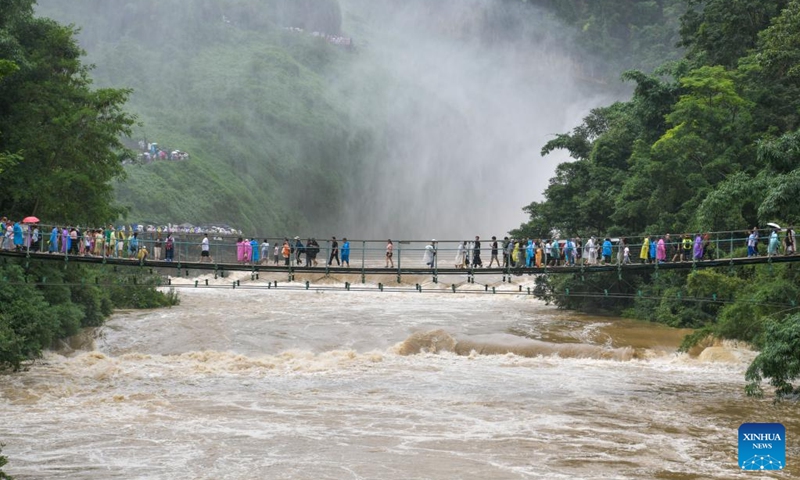 Tourists visit the Huangguoshu Waterfall scenic area in Anshun, southwest China's Guizhou Province, Aug. 2, 2024. Photo: Xinhua