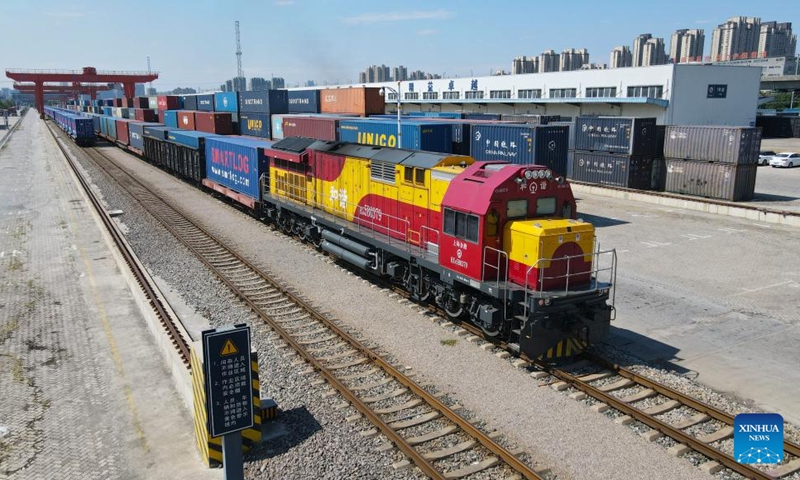 This aerial drone photo taken on Aug. 1, 2024 shows a China-Europe freight train waiting for departure at the logistics base of Hefei north railway station in Hefei, east China's Anhui Province. A total of 380 China-Europe freight trains departing from Hefei between January and July this year, marking a 3 percent increase from the previous year. Photo: Xinhua