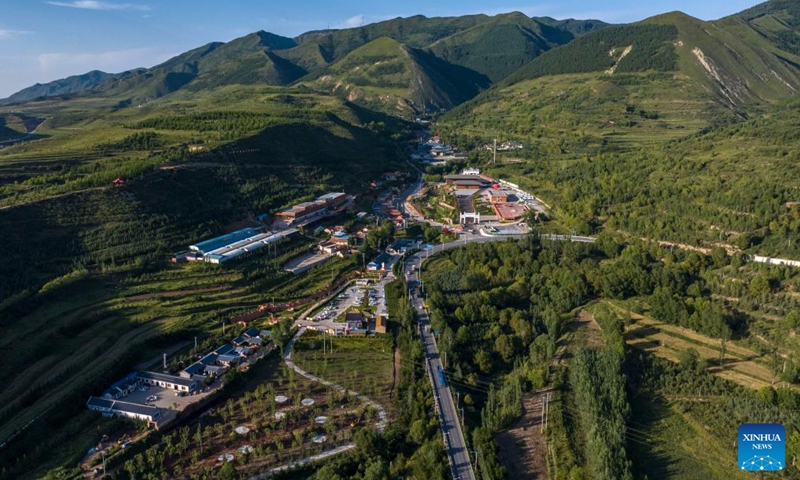 An aerial drone photo taken on Aug. 1, 2024 shows the Yangjiadian Village in Guyuan City, northwest China's Ningxia Hui Autonomous Region. Relying on abundant red tourism resources of the Liupan Mountain, local authorities in Yangjiadian have actively developed homestay and rural tourism to advance rural revitalization. Photo: Xinhua