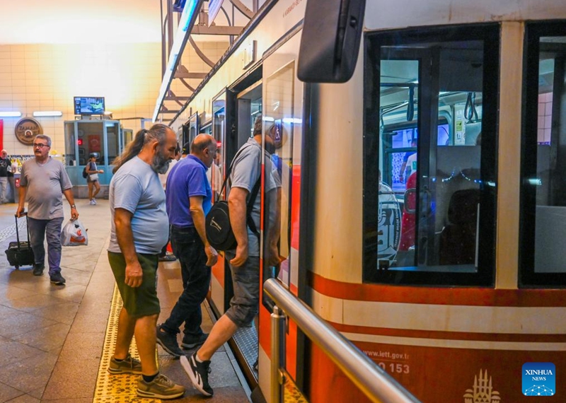 Passengers board a train of the subway line Tünel in Istanbul, Türkiye, July 31, 2024. In 1875, the subway line with two wooden cars, powered by a steam engine, went into operation. The carriages were illuminated by oil lamps as there was no electricity at the time. The line is the second oldest in the world after the one built in 1863 in London.It covers a distance of 573 meters in 90 seconds. Photo: Xinhua