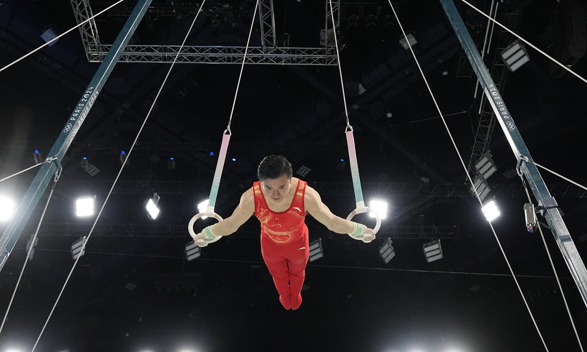 Chinese gymnast Liu Yang competes during the men's artistic gymnastics individual rings finals at the Paris Olympic Games on August 4, 2024. The defending champion scored 15.300 points to lead a 1-2 finish for China, while his compatriot Zou Jingyuan took silver. Photo: VCG