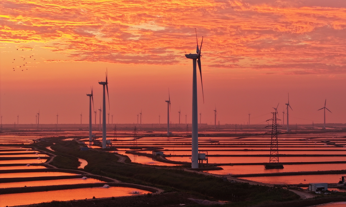 A wind power plant produces power in Yancheng, East China's Jiangsu Province on August 5, 2024. In the first half of 2024, China's cumulative installed wind power capacity reached 466.71 million kilowatts, a year-on-year increase of 19.9 percent. China's steadfast efforts in advancing clean energy and fostering global cooperation have emerged as a crucial driver propelling the world toward a greener future. Photo: VCG