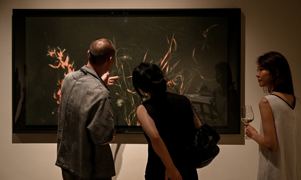 Visitors explore the exhibition in Shanghai. Photo: Courtesy of Fang Space 