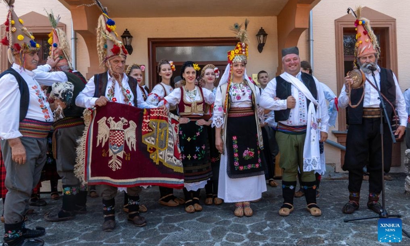 A traditional Serbian wedding ceremony is held during the 63rd Guca Trumpet Festival in the village of Guca, Serbia on Aug. 4, 2024. (Photo: Xinhua)