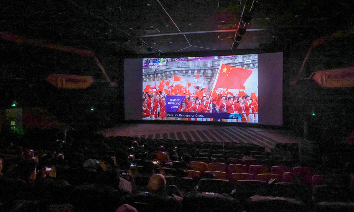 People watch the opening ceremony of the 2024 Paris Olympics live in a cinema in the Haidian district of Beijing on July 27, 2024. Starting from July 27, hundreds of cinemas in China began broadcasting the Games live. Photo: VCG