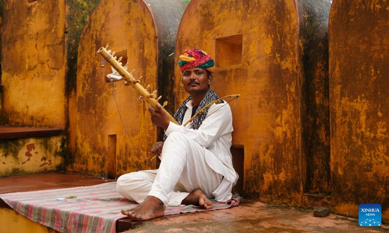 A performer plays traditional Indian instrument at the Amber Fort in Jaipur, India, on Aug. 5, 2024. Jaipur was founded in 1727 and is the capital of Rajasthan, India. The ancient city of Jaipur has iconic buildings such as Amber Fort, Hawa Mahal and City Palace, and was listed on the World Heritage List in 2019. (Photo: Xinhua)