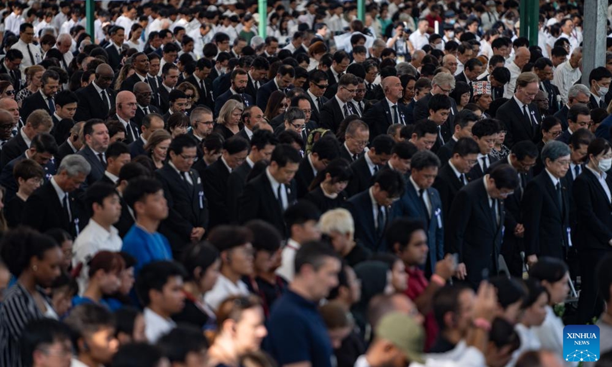 Participants mourn atomic bombing victims during a memorial ceremony on the 79th anniversary of atomic bombing in Hiroshima, Japan, Aug. 6, 2024. As Japan marked the anniversary of atomic bombing on the western city of Hiroshima on Tuesday, people from across the nation gathered to protest the government's accelerated arms build-up, urging it to stick to peace.  (Photo: Xinhua)