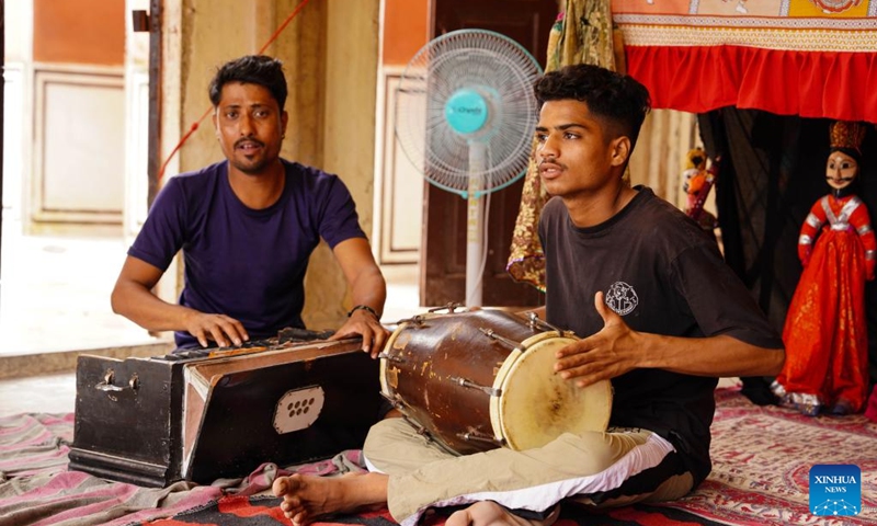 A performer play traditional Indian instruments at the Hawa Mahal in Jaipur, India, on Aug. 5, 2024. Jaipur was founded in 1727 and is the capital of Rajasthan, India. The ancient city of Jaipur has iconic buildings such as Amber Fort, Hawa Mahal and City Palace, and was listed on the World Heritage List in 2019. (Photo: Xinhua)