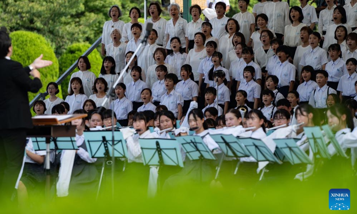 A choir performs during a memorial ceremony on the 79th anniversary of atomic bombing in Hiroshima, Japan, Aug. 6, 2024. As Japan marked the anniversary of atomic bombing on the western city of Hiroshima on Tuesday, people from across the nation gathered to protest the government's accelerated arms build-up, urging it to stick to peace.  (Photo: Xinhua)