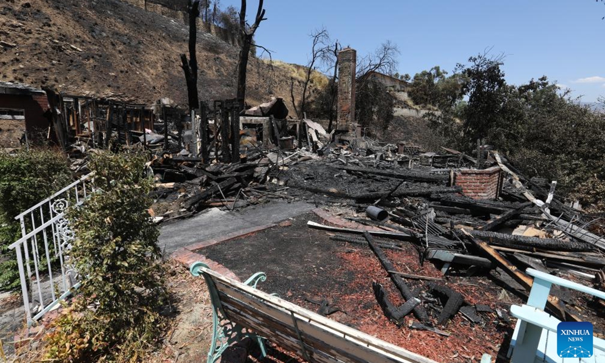 Photo taken on Aug. 6, 2024 shows a building destroyed by a brush fire, dubbed the Edgehill Fire, in San Bernardino County, California, the United States. Multiple homes were damaged or destroyed in a fast-moving brush fire in Southern California before firefighters managed to stop its progress, authorities said on Tuesday.  (Photo: Xinhua)