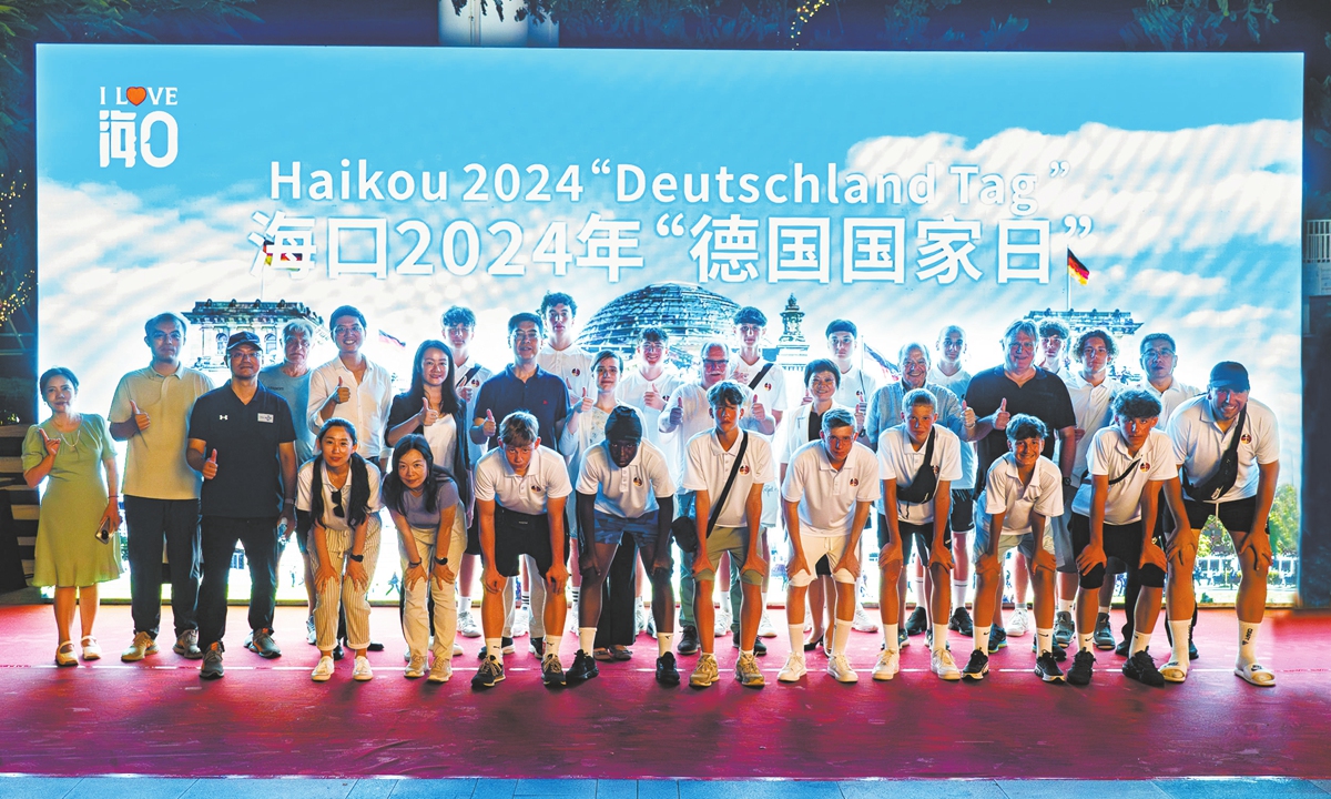 Delegates pose for a group photo at the Haikou 2024 