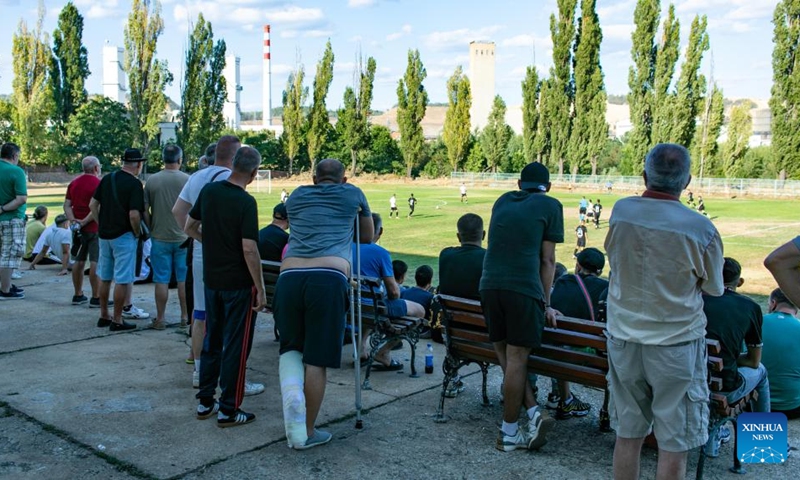 People watch a football game in Bor, Serbia, Aug. 6, 2024. The Serbian branches of China's Zijin Mining Group Co. Ltd marked Miner's Day on Tuesday with a series of events in collaboration with the city administration of Bor city, featuring an award ceremony for employees, exhibitions, cultural programs, traditional crafts displays, and sports events.  (Photo: Xinhua)