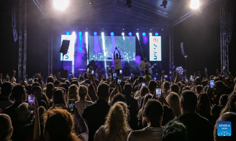 People watch a concert in Bor, Serbia, Aug. 6, 2024. The Serbian branches of China's Zijin Mining Group Co. Ltd marked Miner's Day on Tuesday with a series of events in collaboration with the city administration of Bor city, featuring an award ceremony for employees, exhibitions, cultural programs, traditional crafts displays, and sports events.  (Photo: Xinhua)