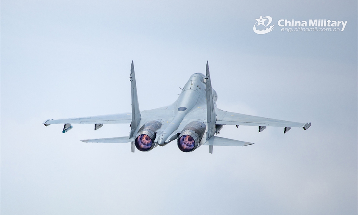 A fighter jet attached to a naval aviation unit under the PLA Southern Theater Command takes off during a multi-subject flight training exercise on June 10, 2024. (eng.chinamil.com.cn/Photo by Fu Jinquan)