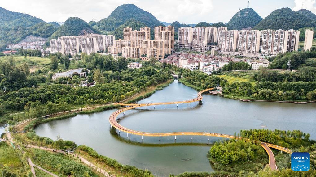 An aerial drone photo taken on Aug. 7, 2024 shows the scenery of Minghu Lake National Wetland Park in Zhongshan District of Liupanshui, southwest China's Guizhou Province. The wetland park, located in Zhongshan District of Liupanshui, is rich in vegetation. (Photo: Xinhua)