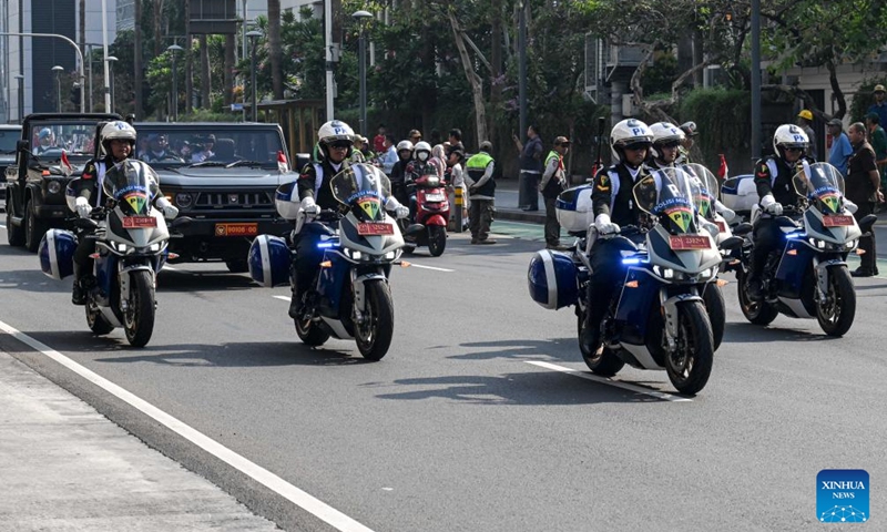 Military officers escort the replica of a heirloom flag and a copy of the Indonesian Independence Proclamation manuscript in Jakarta, Indonesia, Aug. 10, 2024. The flag and the manuscript copy were transported from the National Monument in Jakarta to Indonesia's New Capital Nusantara located in Kalimantan Island for the 79th anniversary of the country's Independence Day, which falls on Aug. 17. Photo: Xinhua