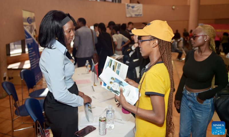 Local graduates talk with a staff member of a Chinese company at a job fair held in University of Botswana in Gaborone, Botswana, Aug. 9, 2024. Eight Chinese companies held a job fair in Botswana on Friday, attracting about 200 applicants from various universities. Photo: Xinhua