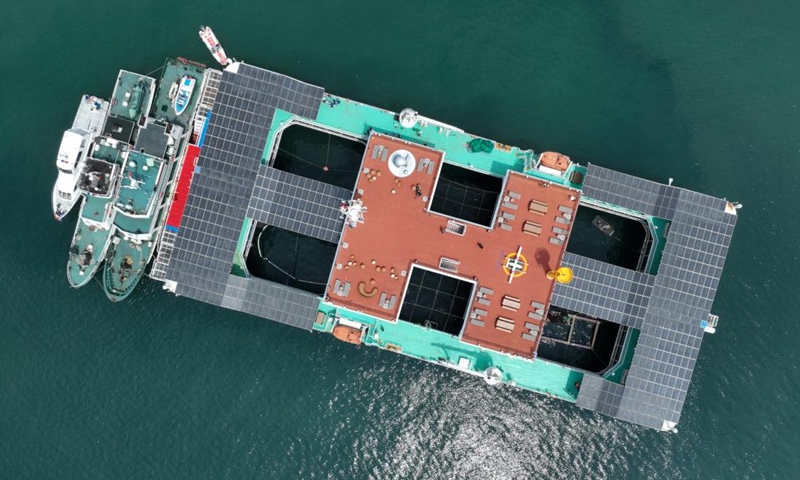 An aerial drone photo taken on Aug. 9, 2024 shows a deep-sea aquaculture platform in Lianjiang County of Fuzhou, southeast China's Fujian Province. Lianjiang County has been actively exploring and supporting the construction of deep-sea aquaculture platforms. Eleven platforms have been put into use here since 2018 and the annual output of high-quality fish reaches nearly 2,000 tonnes. Photo: Xinhua