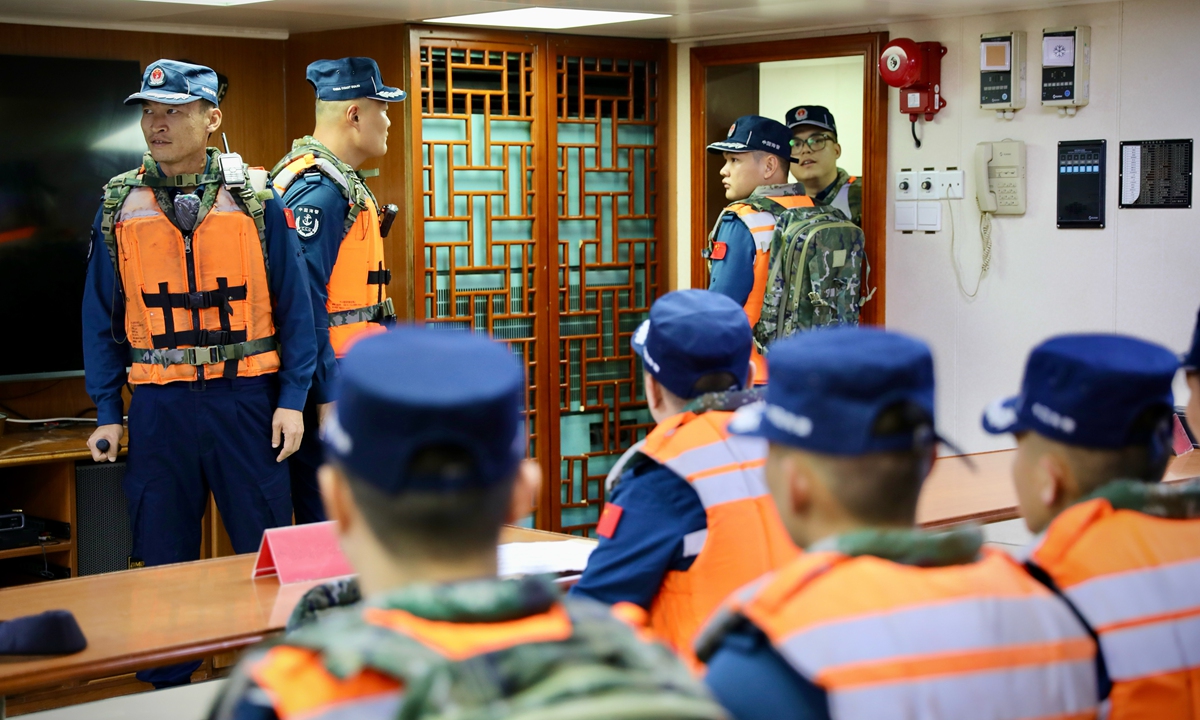 CCG officers conduct law enforcement forensic training on the <em>Wanshan</em> Vessel, in July 2024. Photo: Courtesy of China Coast Guard