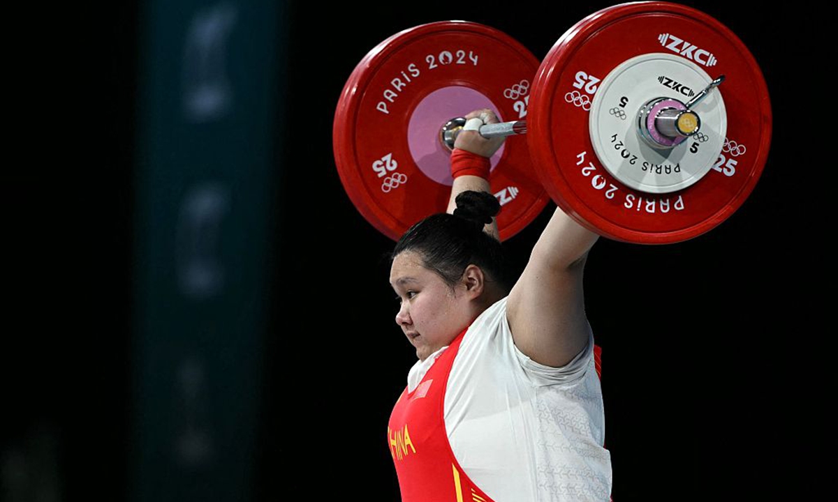 Team China's weightlifter Li Wenwen competes in the women's +81kg weightlifting event during the Paris 2024 Olympic Games at the South Paris Arena in Paris, France, on August 11, 2024. Li claimed the women's +81kg title on the last day of the Paris Olympics on Sunday in the South Paris Arena. It marks China's 40th gold medal in Paris, the country's best result at an overseas Olympic Games. Photo: VCG