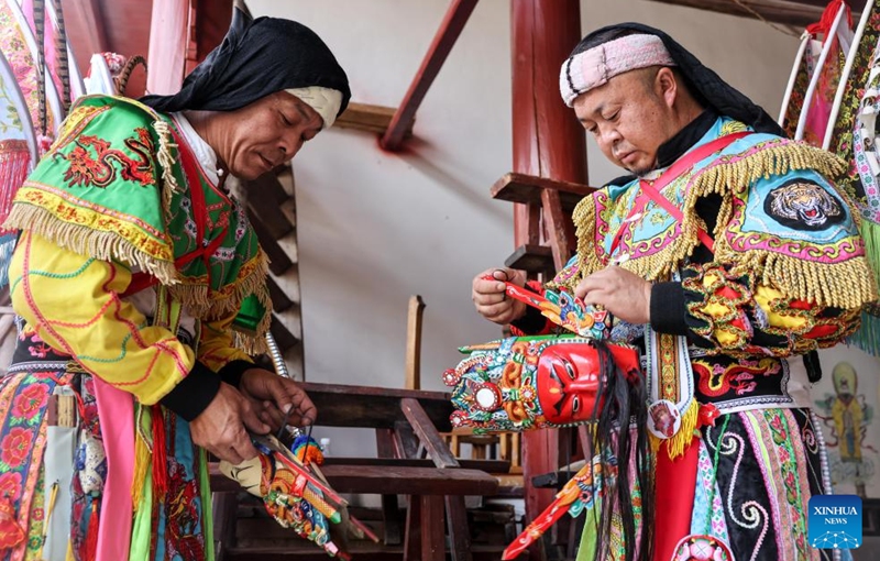 Villagers make preparations for a Dixi opera performance in Jiuxi Village of Daxiqiao Town, Anshun City, southwest China's Guizhou Province, July 24, 2024. Photo: Xinhua