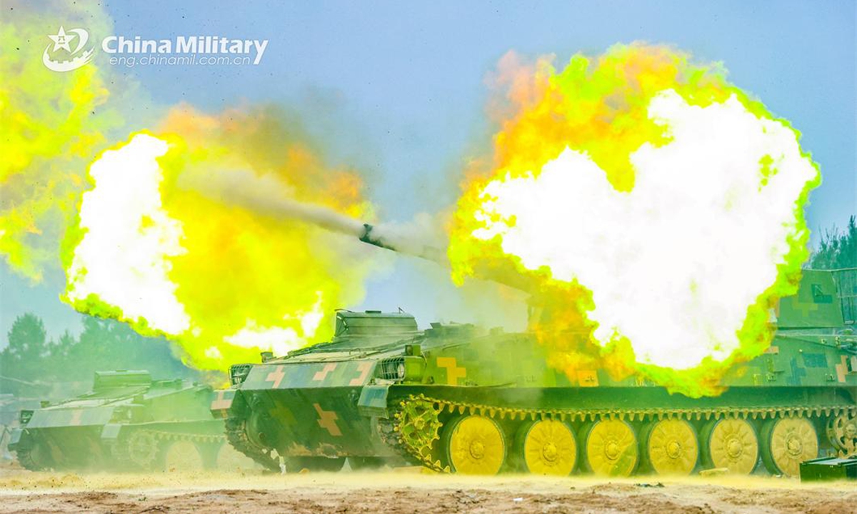 A self-propelled howitzer attached to a brigade under the PLA 71st Group Army fires at mock target during a live-fire training exercise on June 20, 2024. (eng.chinamil.com.cn/Photo by Hu Liangchao)