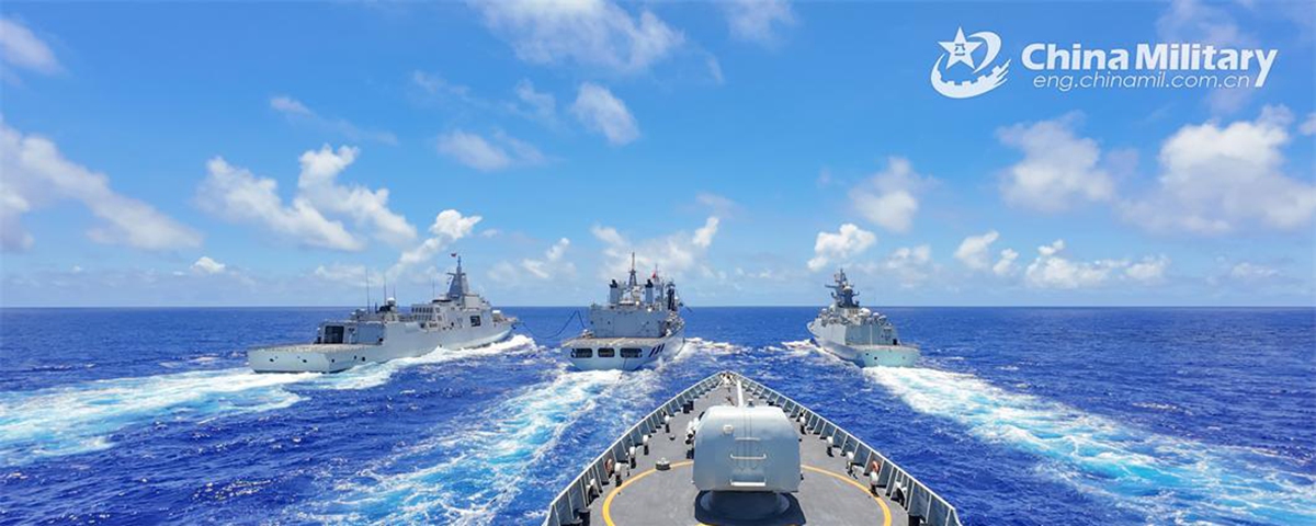 Naval vessels attached to a flotilla of a unit under the PLA Navy conduct replenishment-at-sea during a maritime training exercise on June 12, 2024. (eng.chinamil.com.cn/Photo by Wu Di)