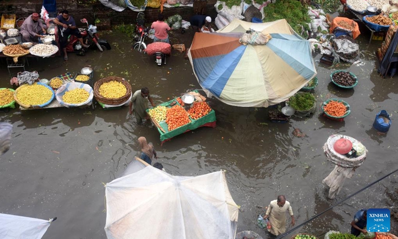 This photo taken on Aug. 11, 2024 shows a flooded fruit and vegetable market after heavy monsoon rain in Lahore, Pakistan. Photo: Xinhua