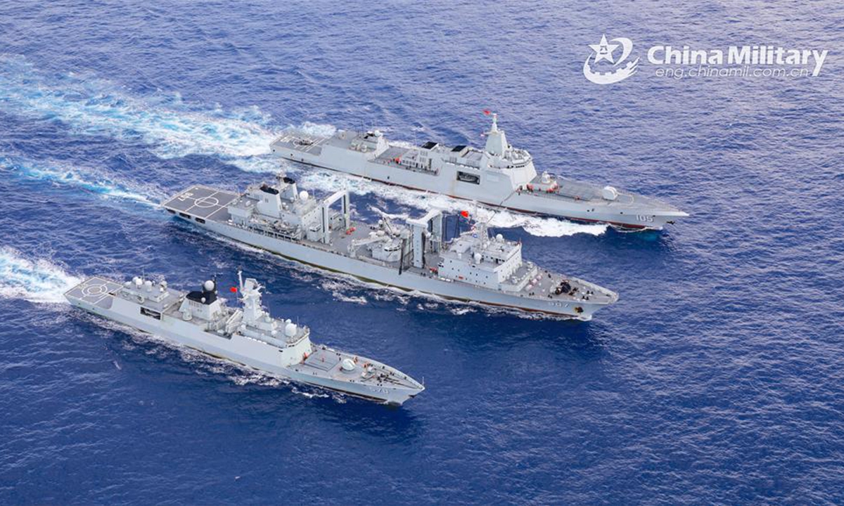 Naval vessels attached to a flotilla of a unit under the PLA Navy conduct replenishment-at-sea during a maritime training exercise on June 12, 2024. (eng.chinamil.com.cn/Photo by Wu Di)