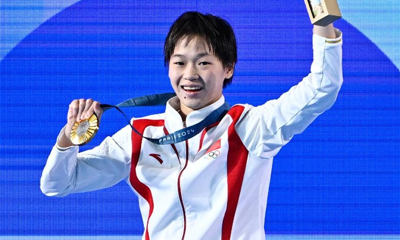 Gold medalist Quan Hongchan of China attends the awarding ceremony after the women's 10m platform final of diving at the Paris 2024 Olympic Games in Saint-Denis, France, Aug. 6, 2024. (Xinhua)