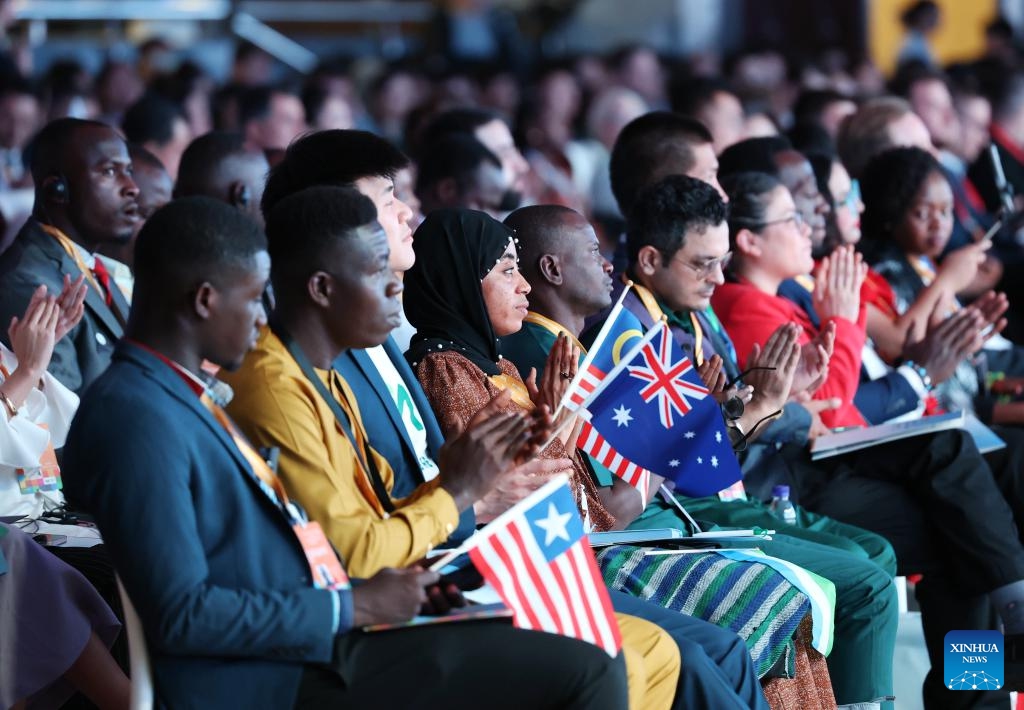 Youth representatives attend the opening ceremony of the 2024 World Youth Development Forum in Beijing, capital of China, Aug. 12, 2024. The 2024 World Youth Development Forum opened in Beijing on Monday, with more than 2,000 young people from over 130 countries and 20 international organizations participating both online and on-site. Monday marks International Youth Day. More than 500 young leaders and youth representatives gathered here for the forum's opening ceremony and plenary meeting.（Photo: Xinhua)