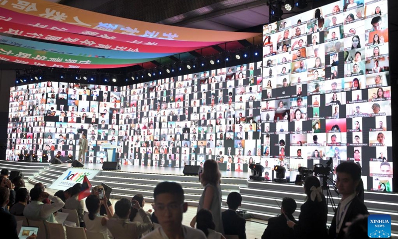 Online participants are seen on a screen during the opening ceremony of the 2024 World Youth Development Forum in Beijing, capital of China, Aug. 12, 2024. The 2024 World Youth Development Forum opened in Beijing on Monday, with more than 2,000 young people from over 130 countries and 20 international organizations participating both online and on-site. Monday marks International Youth Day. More than 500 young leaders and youth representatives gathered here for the forum's opening ceremony and plenary meeting.（Photo: Xinhua)