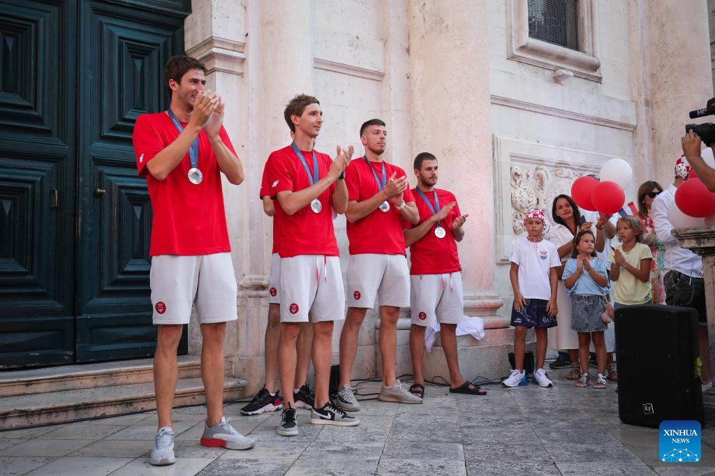 Members of the Croatian men's water polo team meet fans at a welcome ceremony held in Dubrovnik, Croatia, on Aug. 13, 2024. The team won the silver medal in the men's water polo event at the Paris Olympic Games. (Photo: Xinhua)