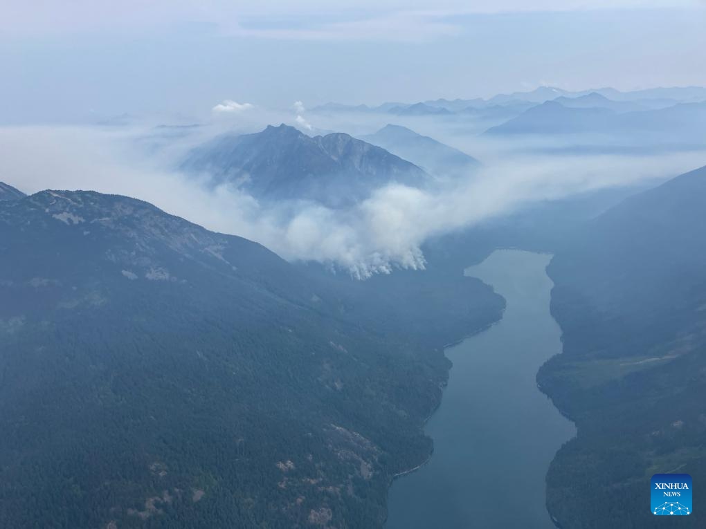 Aerial photo provided by BC Wildfire Service shows smoke rising from wildfires near Shetland Creek, British Columbia, Canada, on Aug. 12, 2024. There are 428 active wildfires across British Columbia in Canada, according to BC Wildfire Service. (Photo: Xinhua)