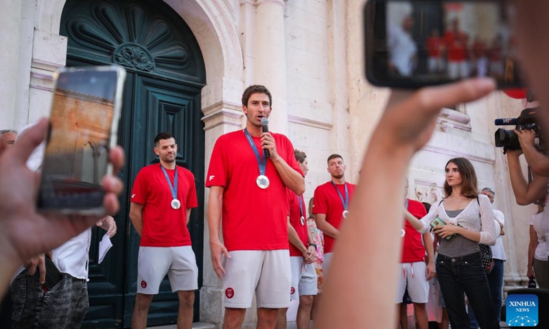 Maro Jokovic of Croatian men's water polo team speaks at a welcome ceremony held in Dubrovnik, Croatia, on Aug. 13, 2024. The team won the silver medal in the men's water polo event at the Paris Olympic Games. (Photo: Xinhua)