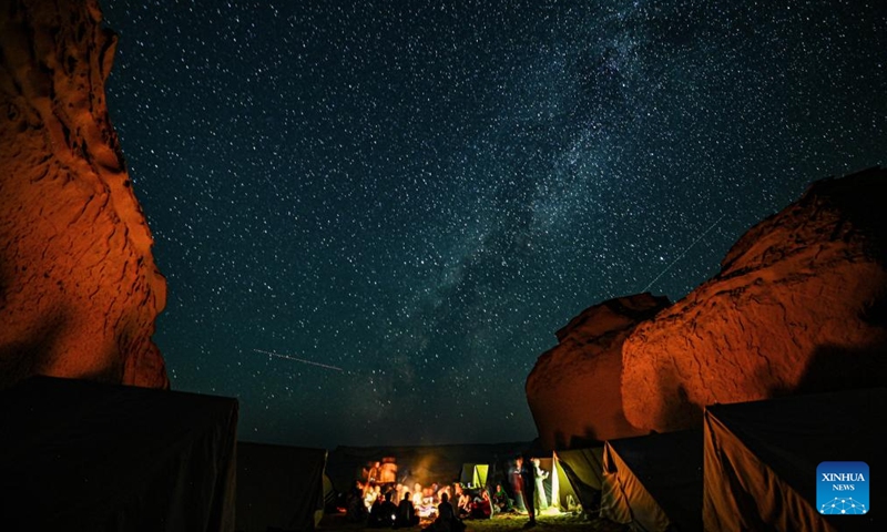 This long exposure photo shows meteors flying past the starry sky over the desert in Fayoum, Egypt, Aug. 13, 2024. (Photo: Xinhua)