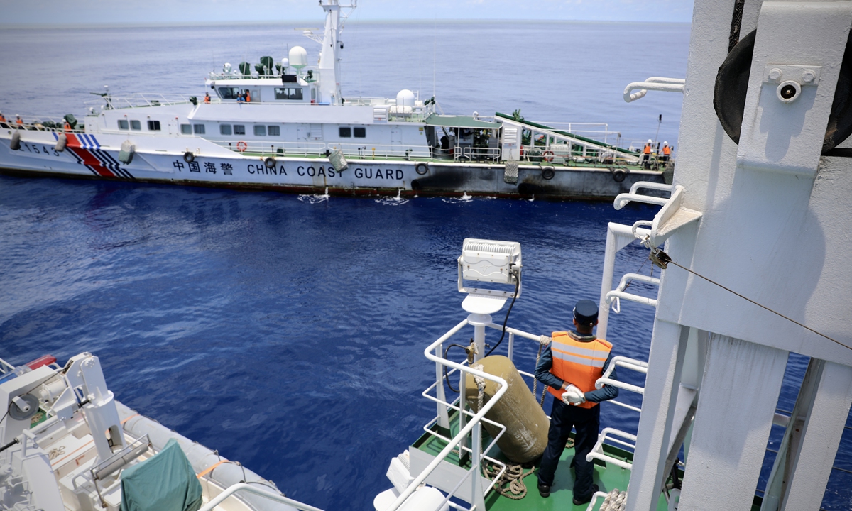 The?<em>Wanshan</em>?formation conduct berthing operation exercise in waters off Huangyan Dao on July 4, 2024. Photo: Courtesy of China Coast Guard