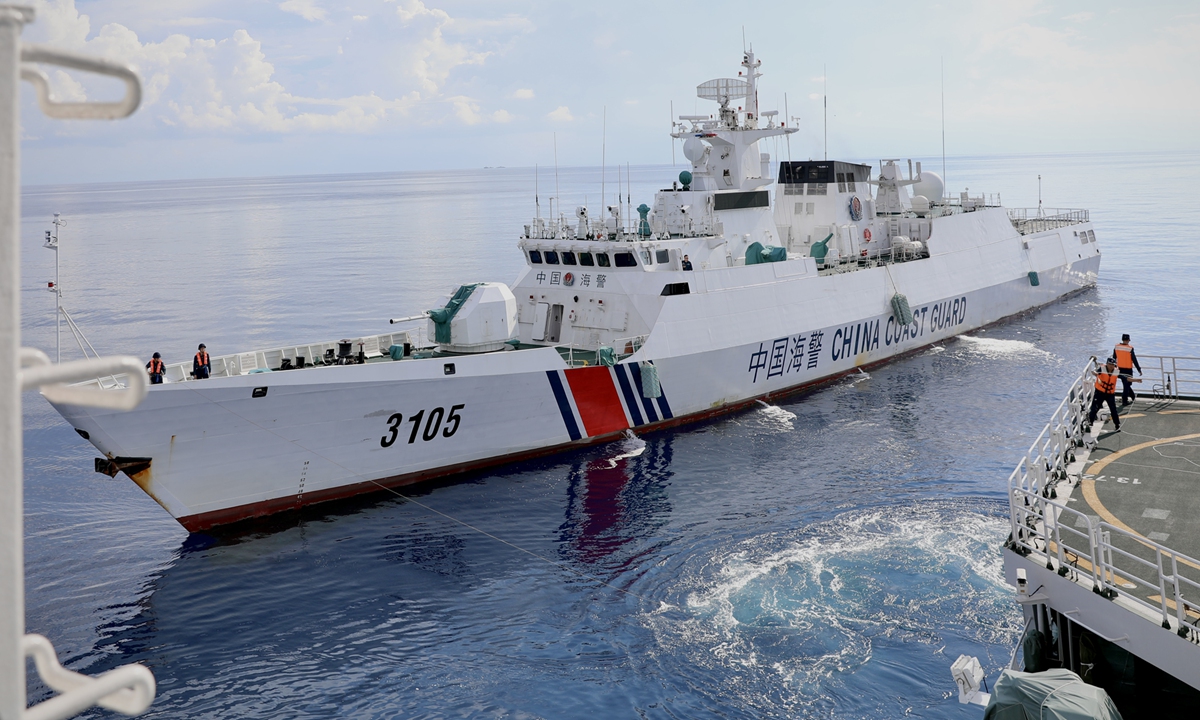 Law enforcers attend a tow training on China Coast Guard vessel Wanshan formation patrolling the waters off Huangyan Dao in South China Sea on July 8, 2024.?Photo: Lin Xiaoyi/GT